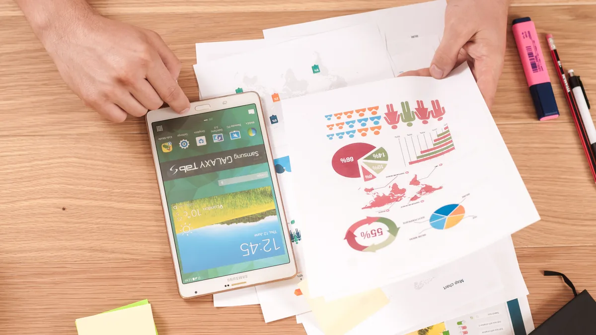Professional reviewing financial plans and career goals with disciplined focus