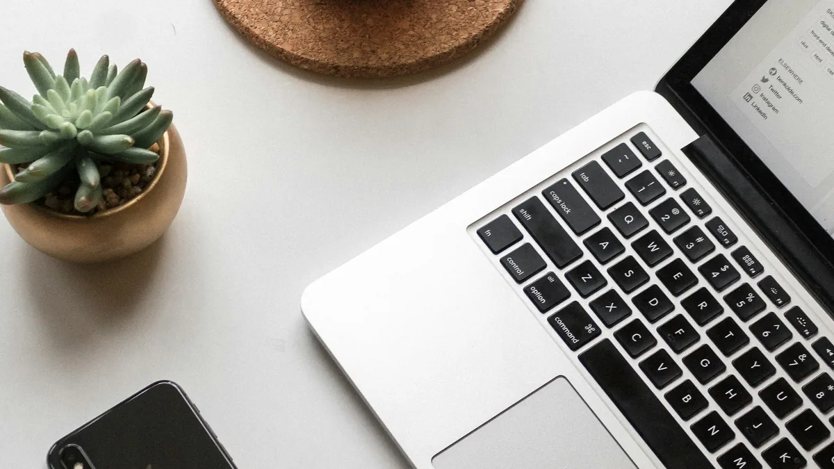 Content Creator and SEO Specialist Analyzing Keyword Performance and Publishing Strategy